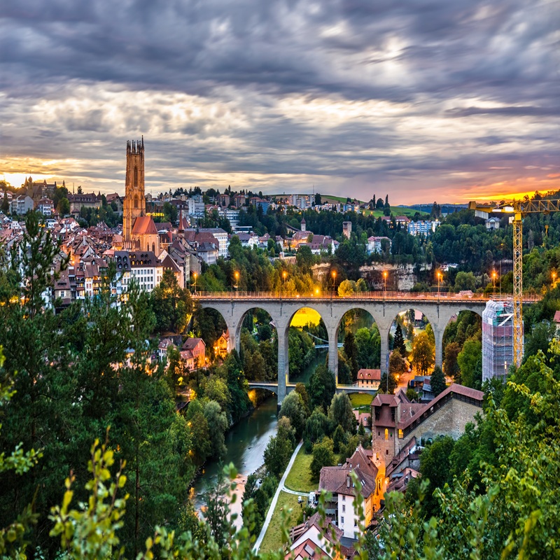 Evening skyline of Fribourg, Switzerland Düsseldorf Meisterkonzerte Start